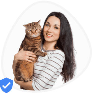 Maria, the woman with white shirt with grey strips holding a brown cat with white strips in her arms is a Pawland cat sitter
