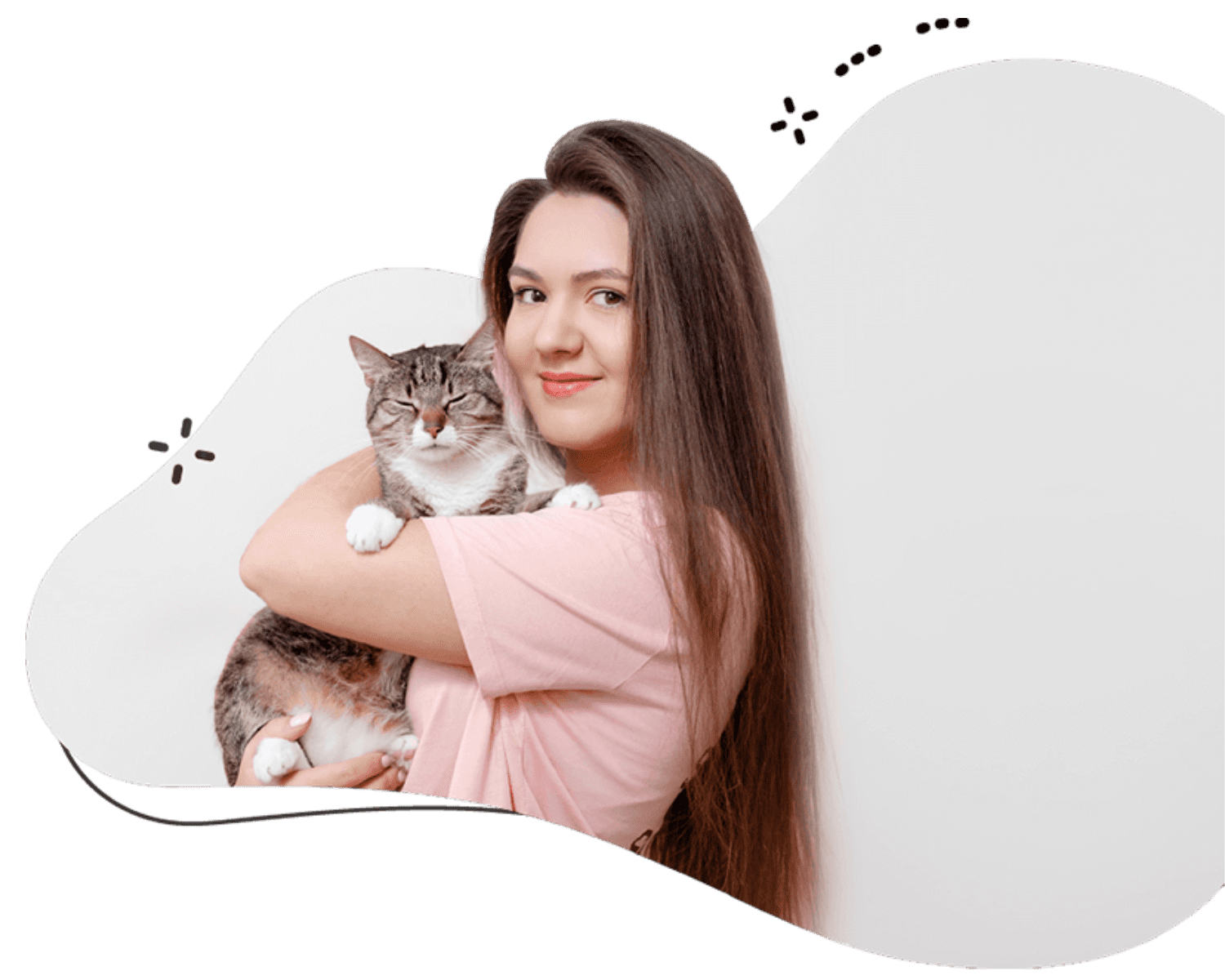 Female cat sitter in a pink tee shirt holding a British longhair cat in her arms who provides cat sitting services