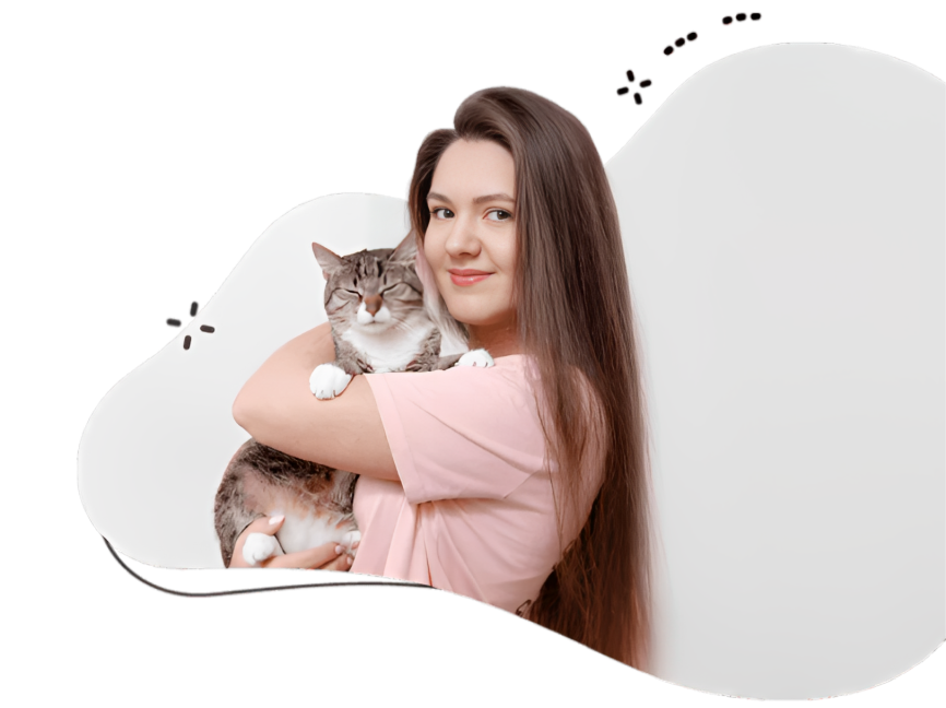 Pawland Cat Sitter Dubai holding the british longhair cat in her arms is providing cat boarding services in Dubai