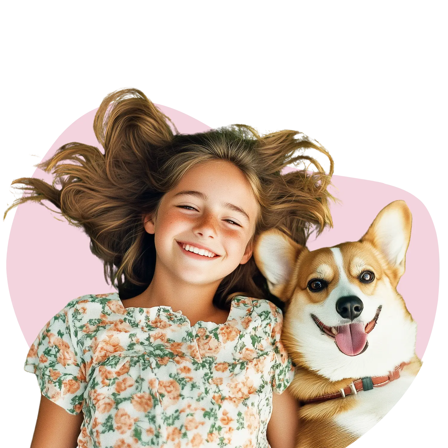 Cute small girl smiling and playing with a happy dog