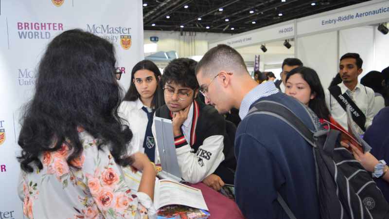 School students attending a school function and participating in activities at one of the best schools in Sharjah.