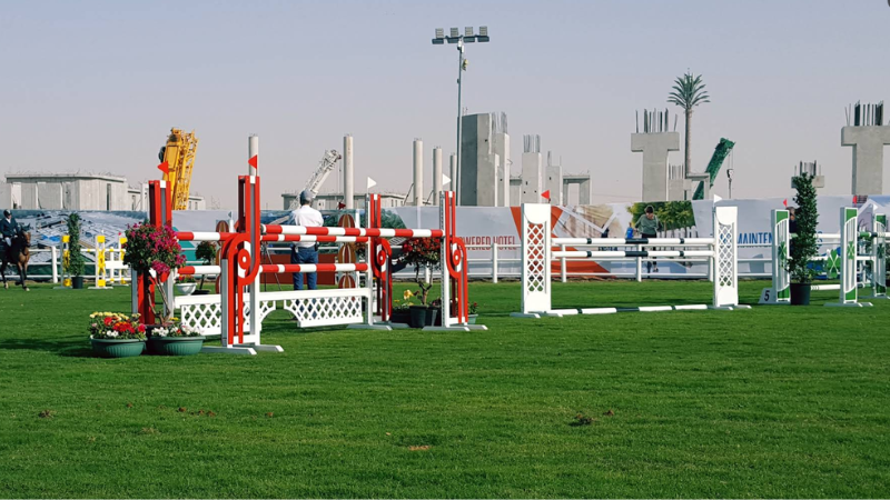 Horse rider exploring the scenic green spine and nature trails of The Sustainable City Dubai.