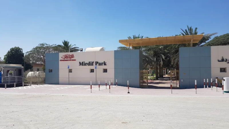 Mirdif Park main entrance gate with landscaped greenery in Dubai.