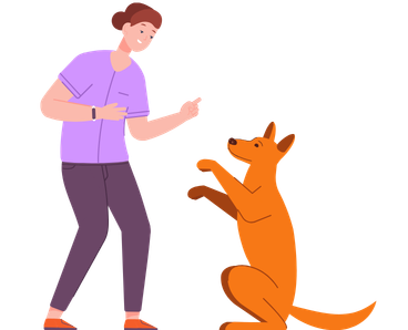 Pet owner teaching good behavior to their dog indoors